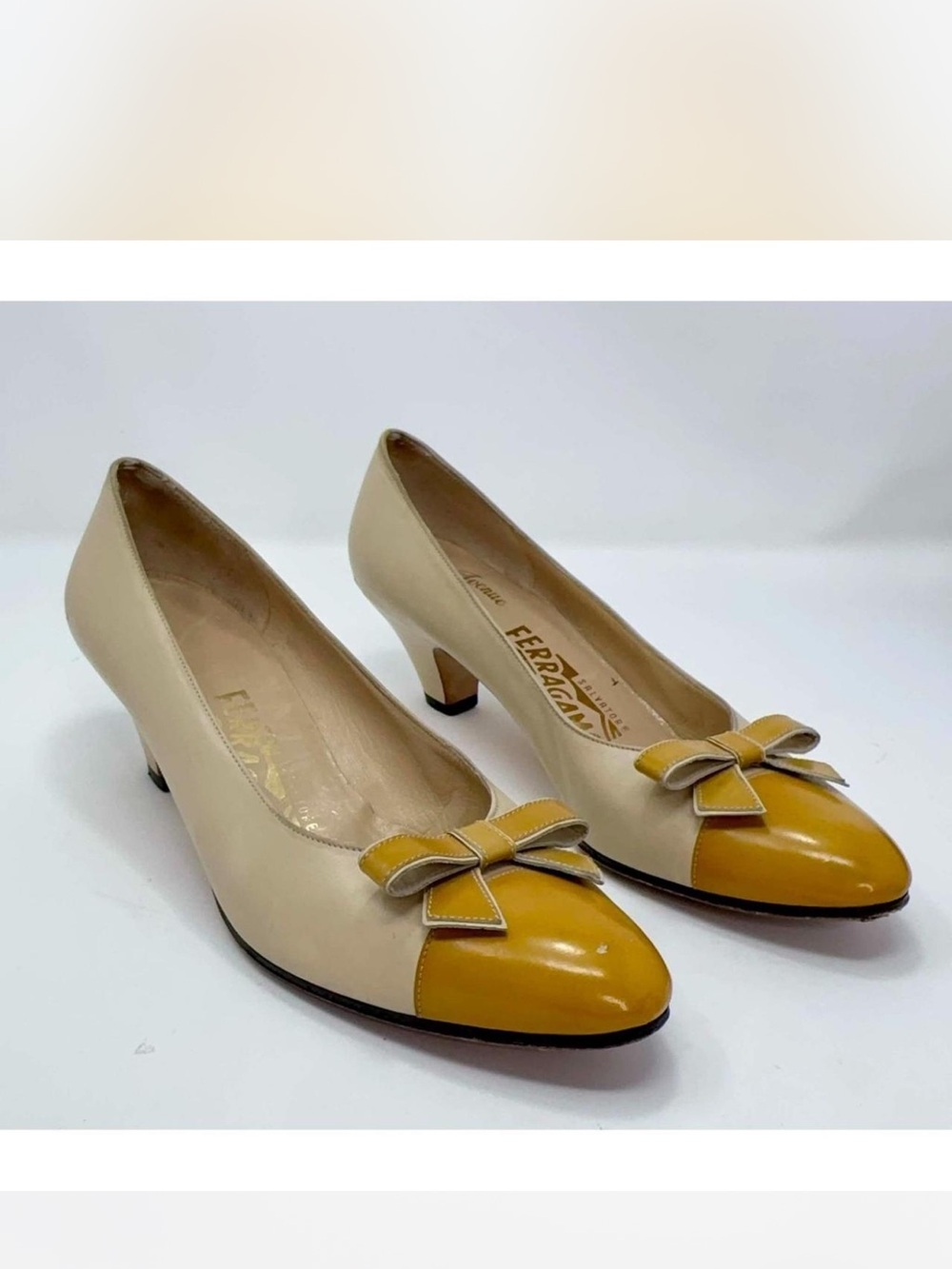 Salvatore Ferragamo Cream Leather Pumps with Mustard Patent Toe and Bow